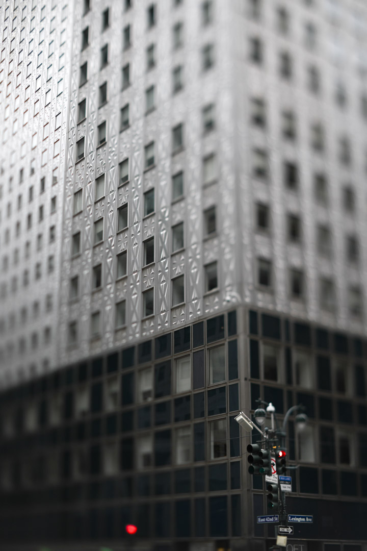 A Manhattan building corner above street traffic